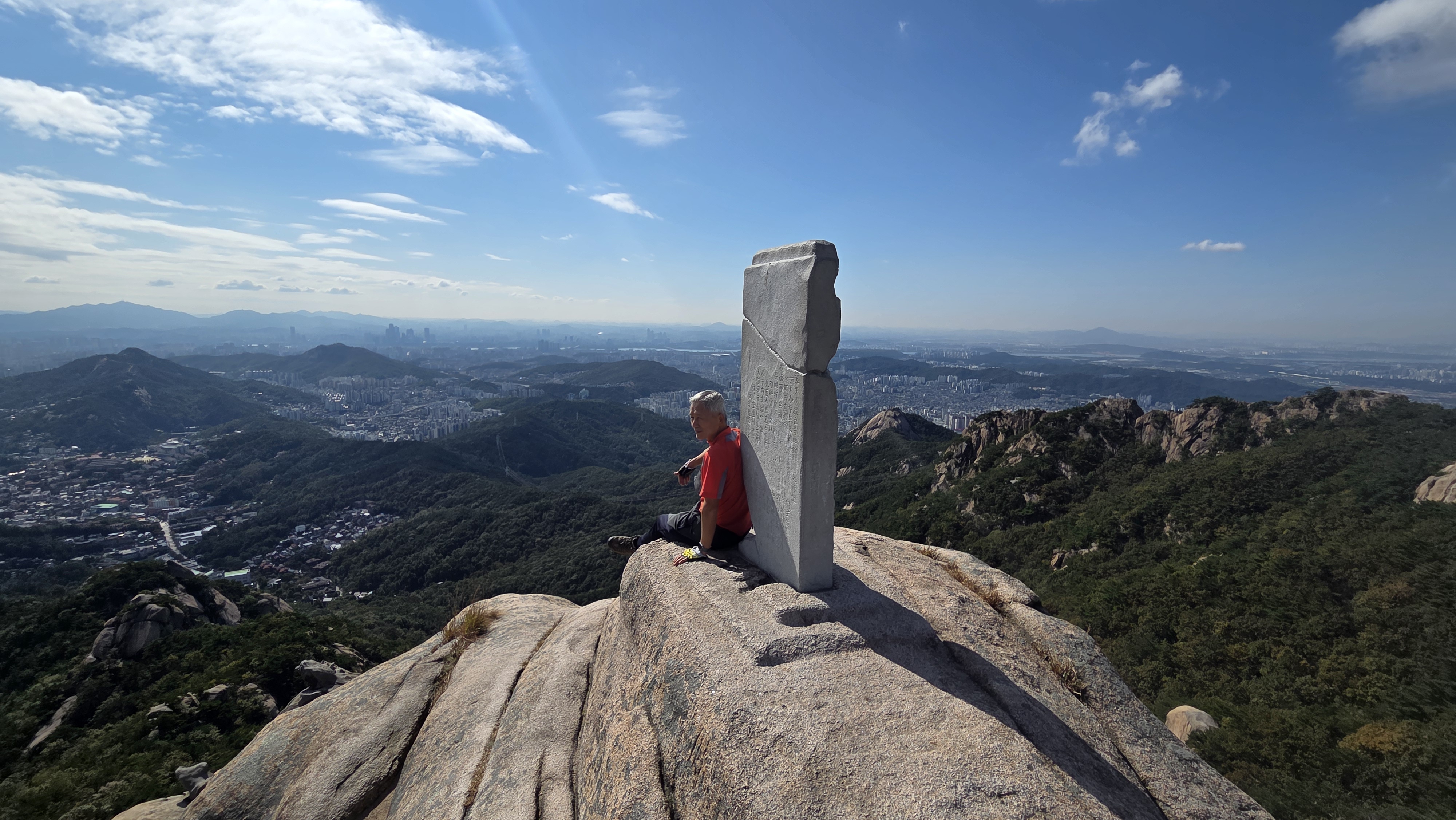 Historic Bibong Ridge Trail — Historic stone monument on Bibong-Jokduribong and Hangnobong in the distant right