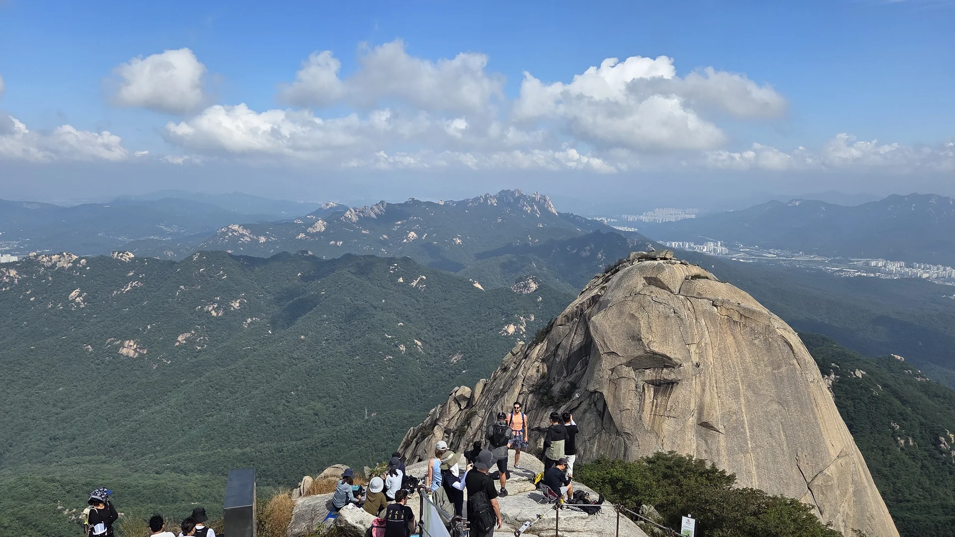 Fastest and most  popular route to Baegundae — From Baegundae, Insubong Peak dominates the view, with Dobongsan visible far beyond